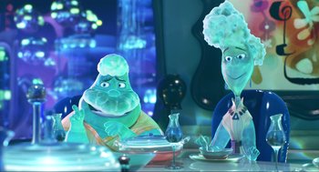 Movie still from “Elemental” (2023), directed by Peter Sohn – A couple of people sitting at a dinner table; Medium shot, Over the shoulder angle