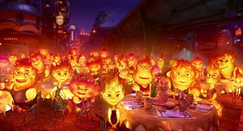 Movie still from “Elemental” (2023), directed by Peter Sohn – A group of people that are sitting at a dinner table; Wide shot, High angle