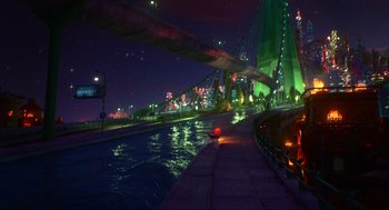 Movie still from “Elemental” (2023), directed by Peter Sohn – A view of a bridge lit up at night; Extreme Wide shot, High angle
