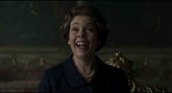 Movie still from “Elizabeth: A Portrait in Part(s)” (2022), directed by Roger Michell – An older woman smiling with her mouth wide open; Close Up shot, Low angle