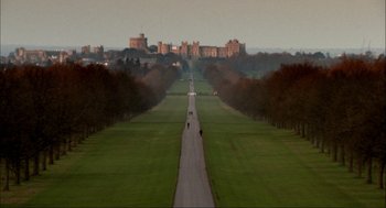 Movie still from “Elizabeth: A Portrait in Part(s)” (2022), directed by Roger Michell – A view of a park and a castle from a distance; Extreme Wide shot, High angle