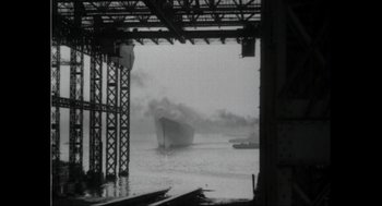 Movie still from “Elizabeth: A Portrait in Part(s)” (2022), directed by Roger Michell – A large ship in a body of water; Extreme Wide shot, High angle