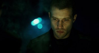 Movie still from “A Good Day to Die Hard” (2013), directed by John Moore – A person in a dark room; Close Up shot, Low angle