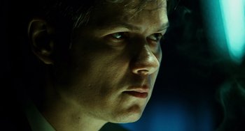 Movie still from “A Good Day to Die Hard” (2013), directed by John Moore – A man's face in the dark; Close Up shot, Low angle