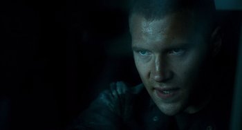 Movie still from “A Good Day to Die Hard” (2013), directed by John Moore – A person in a dark room; Close Up shot, Low angle