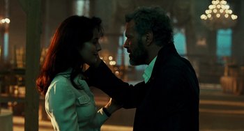 Movie still from “A Good Day to Die Hard” (2013), directed by John Moore – A man and a woman touching each other's hair; Close Up shot, Low angle