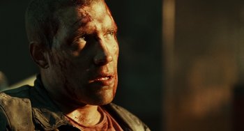 Movie still from “A Good Day to Die Hard” (2013), directed by John Moore – A person with blood all over his face; Close Up shot, Low angle