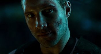 Movie still from “A Good Day to Die Hard” (2013), directed by John Moore – A person with a black shirt on; Close Up shot, Low angle