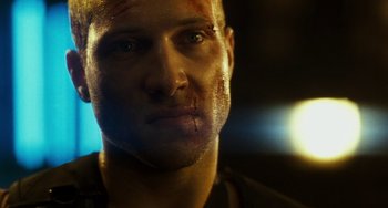 Movie still from “A Good Day to Die Hard” (2013), directed by John Moore – A person with blood on his face; Close Up shot, Low angle