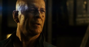 Movie still from “A Good Day to Die Hard” (2013), directed by John Moore – A man's face with a piercing on his nose; Close Up shot, Low angle