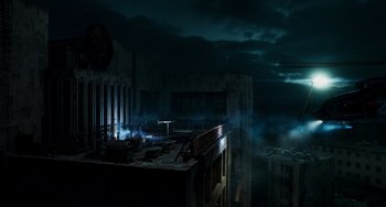 Movie still from “A Good Day to Die Hard” (2013), directed by John Moore – A building that has been destroyed in the dark; Extreme Wide shot, High angle