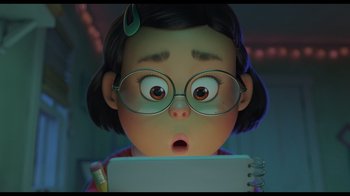 An animated girl looks surprised while holding a tablet
