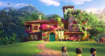 Movie still from “Encanto” (2021), directed by Charise Castro Smith – Two children are looking at a colorful house; Extreme Wide shot, Low angle