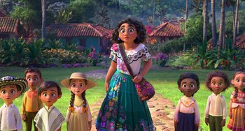 Movie still from “Encanto” (2021), directed by Charise Castro Smith – A group of young girls standing next to each other on a dirt path; Wide shot, Over the shoulder angle