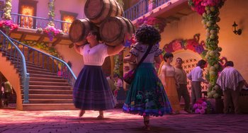 Movie still from “Encanto” (2021), directed by Charise Castro Smith – A group of people standing next to each other in a room; Wide shot, Over the shoulder angle