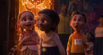 Movie still from “Encanto” (2021), directed by Charise Castro Smith – A group of children standing next to each other; Medium shot, Over the shoulder angle