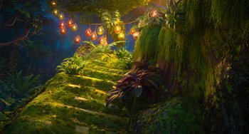 Movie still from “Encanto” (2021), directed by Charise Castro Smith – An image of an outdoor scene with lights hanging from the trees; Extreme Wide shot, Low angle