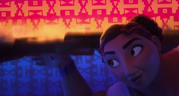 Movie still from “Encanto” (2021), directed by Charise Castro Smith – A person holding a gun; Close Up shot, Overhead angle