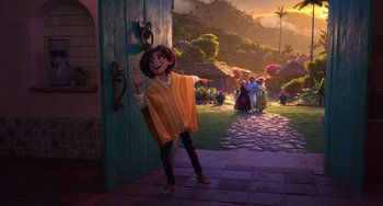 Movie still from “Encanto” (2021), directed by Charise Castro Smith – A scene with a person standing in front of a door; Wide shot, Over the shoulder angle