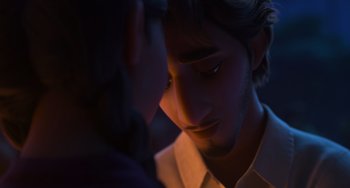 Movie still from “Encanto” (2021), directed by Charise Castro Smith – A man is looking down at another man's face; Close Up shot, Over the shoulder angle
