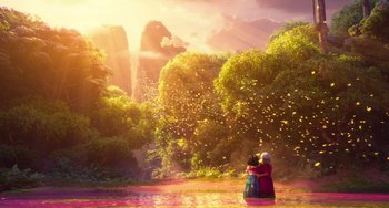 Movie still from “Encanto” (2021), directed by Charise Castro Smith – A woman and a child standing in the water near a waterfall; Extreme Wide shot, Low angle