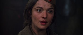 Movie still from “Enemy at the Gates” (2001), directed by Jean-Jacques Annaud – A person wearing a uniform; Close Up shot, Low angle