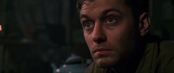 Movie still from “Enemy at the Gates” (2001), directed by Jean-Jacques Annaud – A man's eyes and face; Close Up shot, Low angle