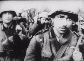 Movie still from “A Hidden Life” (2019), directed by Terrence Malick – An old photo of a man in a military uniform; Close Up shot, High angle