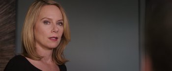 Movie still from “Escape Plan” (2013), directed by Mikael Håfström – A person wearing a black shirt; Close Up shot, Low angle