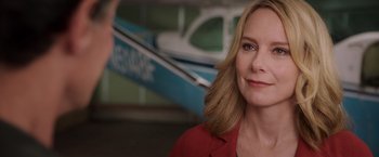 Movie still from “Escape Plan” (2013), directed by Mikael Håfström – A person wearing a red jacket; Close Up shot, Over the shoulder angle