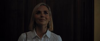 Movie still from “Escape Room: Tournament of Champions” (2021), directed by Adam Robitel – A woman in a white shirt is looking up; Close Up shot, Low angle