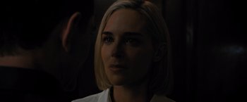 Movie still from “Escape Room: Tournament of Champions” (2021), directed by Adam Robitel – A person wearing a white shirt; Close Up shot, Over the shoulder angle