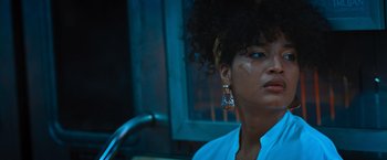 Movie still from “Escape Room: Tournament of Champions” (2021), directed by Adam Robitel – A person wearing a white shirt; Close Up shot, Low angle