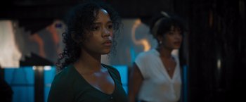 Movie still from “Escape Room: Tournament of Champions” (2021), directed by Adam Robitel – Two women standing next to each other in front of a window; Close Up shot, Over the shoulder angle