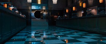 Movie still from “Escape Room: Tournament of Champions” (2021), directed by Adam Robitel – A black and white checkered floor in a room; Extreme Wide shot, High angle