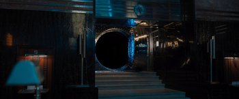 Movie still from “Escape Room: Tournament of Champions” (2021), directed by Adam Robitel – A tunnel with a clock in the middle of the tunnel; Extreme Wide shot, Low angle