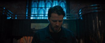 Movie still from “Escape Room: Tournament of Champions” (2021), directed by Adam Robitel – A person wearing a black shirt; Close Up shot, Low angle