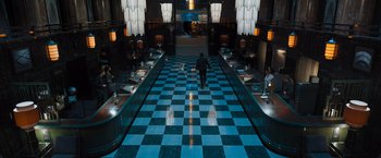 Movie still from “Escape Room: Tournament of Champions” (2021), directed by Adam Robitel – A man walking down a hall way in a building; Extreme Wide shot, High angle