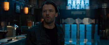 Movie still from “Escape Room: Tournament of Champions” (2021), directed by Adam Robitel – A person with long hair; Close Up shot, Over the shoulder angle