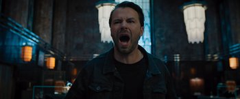 Movie still from “Escape Room: Tournament of Champions” (2021), directed by Adam Robitel – A man with his mouth wide open and his eyes wide open; Close Up shot, Low angle