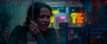 Movie still from “Escape Room: Tournament of Champions” (2021), directed by Adam Robitel – A woman looking out of a window at night; Close Up shot, Low angle