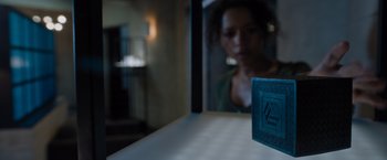 Movie still from “Escape Room: Tournament of Champions” (2021), directed by Adam Robitel – A woman looking out of a window in a room; Close Up shot, Overhead angle