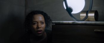 Movie still from “Escape Room: Tournament of Champions” (2021), directed by Adam Robitel – A person looking at the camera; Close Up shot, Low angle