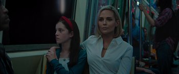 Movie still from “Escape Room: Tournament of Champions” (2021), directed by Adam Robitel – A woman and a young girl sitting next to each other; Close Up shot, Over the shoulder angle