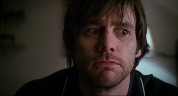 Movie still from “Eternal Sunshine of the Spotless Mind” (2004), directed by Michel Gondry – A person with long hair; Close Up shot, Low angle