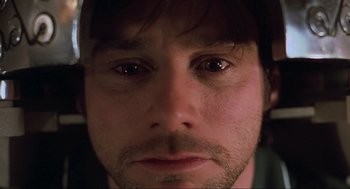 Movie still from “Eternal Sunshine of the Spotless Mind” (2004), directed by Michel Gondry – A man's eyes and face; Extreme Close Up shot, Overhead angle