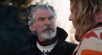 Movie still from “Eurovision Song Contest: The Story of Fire Saga” (2020), directed by David Dobkin – An older man with a long gray beard talking to a younger man; Close Up shot, Over the shoulder angle