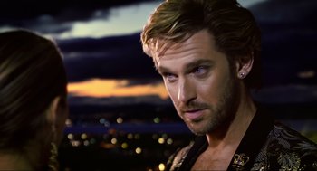 Movie still from “Eurovision Song Contest: The Story of Fire Saga” (2020), directed by David Dobkin – A person wearing a jacket; Close Up shot, Over the shoulder angle