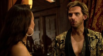 Movie still from “Eurovision Song Contest: The Story of Fire Saga” (2020), directed by David Dobkin – A man and a woman are looking at each other; Close Up shot, Over the shoulder angle