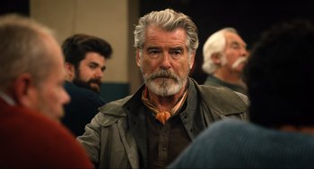 Movie still from “Eurovision Song Contest: The Story of Fire Saga” (2020), directed by David Dobkin – A man with grey hair and a gray beard; Close Up shot, Over the shoulder angle